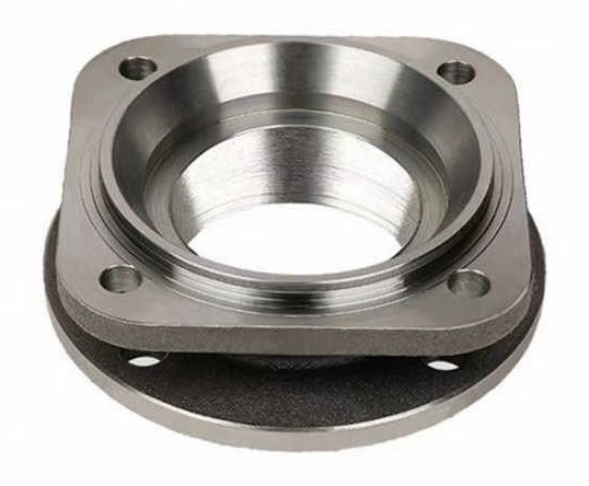 Machined hub flange component with bolt holes
