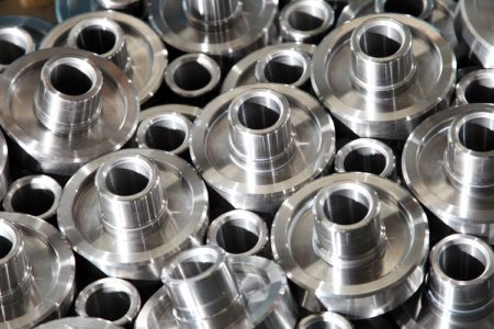 CNC machined metal components with finished bores and faces